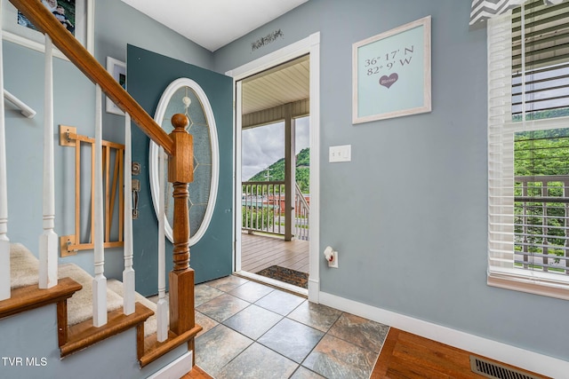 522 Crook St, Hampton, TN 37658 - entrance foyer featuring stairway and baseboards