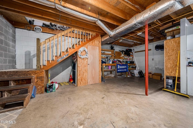 522 Crook St, Hampton, TN 37658 - unfinished below grade area featuring stairs and concrete block wall