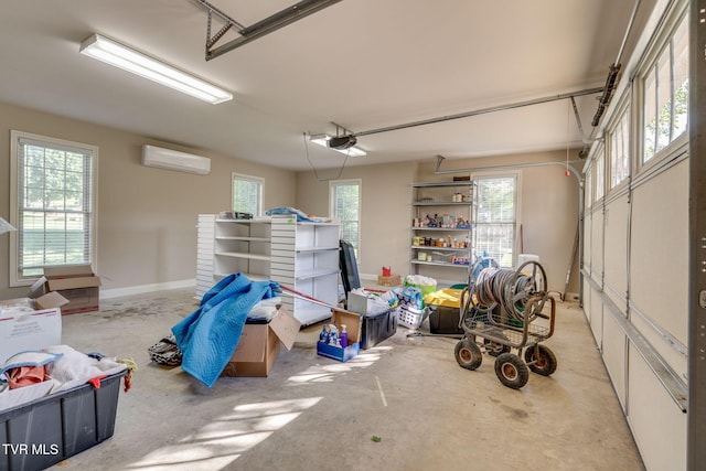 1001 Willows Trace Dr, Johnson City, TN 37601 - garage featuring a wall unit AC and a garage door opener