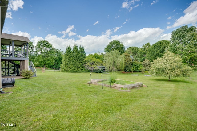 1001 Willows Trace Dr, Johnson City, TN 37601 - view of green lawn featuring a vegetable garden, stairs, and view of scattered trees