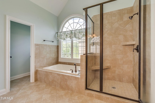 1001 Willows Trace Dr, Johnson City, TN 37601 - bathroom featuring healthy amount of natural light, a bath, a stall shower, and vaulted ceiling