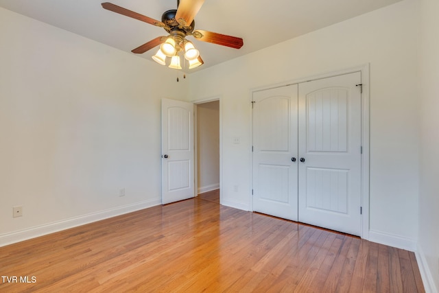 1001 Willows Trace Dr, Johnson City, TN 37601 - unfurnished bedroom featuring light wood-style floors, a closet, and baseboards