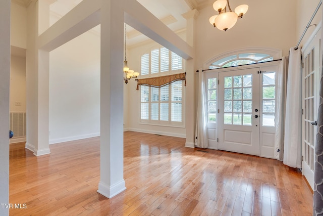 1001 Willows Trace Dr, Johnson City, TN 37601 - foyer with a chandelier, light wood finished floors, a high ceiling, and baseboards