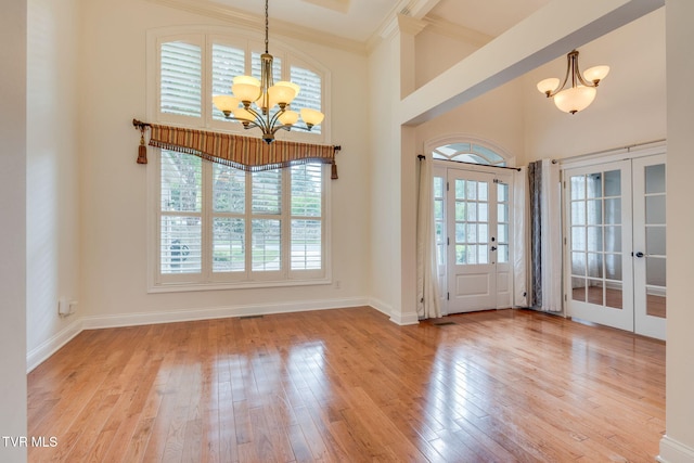 1001 Willows Trace Dr, Johnson City, TN 37601 - foyer entrance with french doors, a chandelier, hardwood / wood-style flooring, crown molding, and baseboards