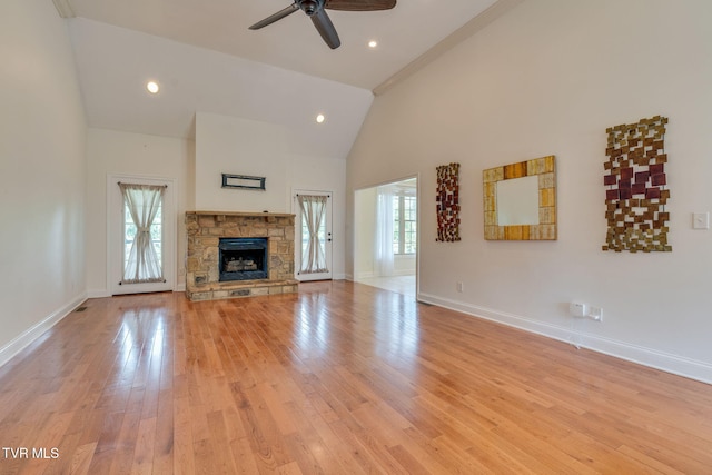 1001 Willows Trace Dr, Johnson City, TN 37601 - unfurnished living room with high vaulted ceiling, a ceiling fan, a fireplace, baseboards, and light wood finished floors