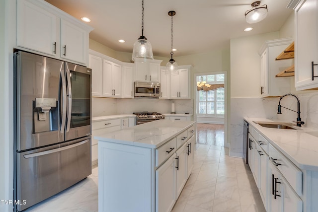 1001 Willows Trace Dr, Johnson City, TN 37601 - kitchen with appliances with stainless steel finishes, open shelves, a sink, light marble finish flooring, and white cabinets