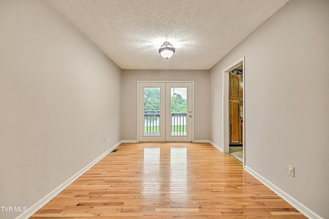 145 Linda Hts, Fall Branch, TN 37656 - empty room with a textured ceiling, light wood-style floors, and baseboards