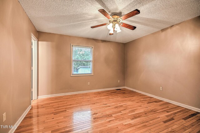 145 Linda Hts, Fall Branch, TN 37656 - spare room featuring light wood finished floors, a textured ceiling, ceiling fan, and baseboards