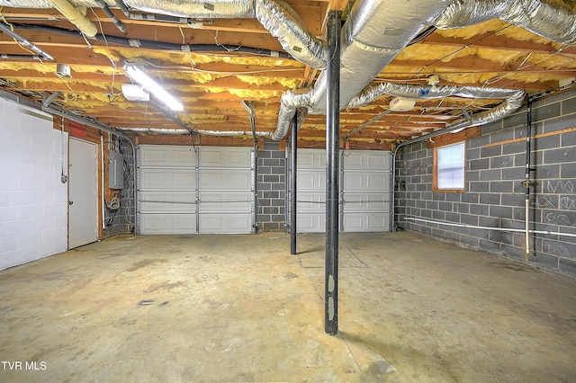 145 Linda Hts, Fall Branch, TN 37656 - garage featuring electric panel and concrete block wall