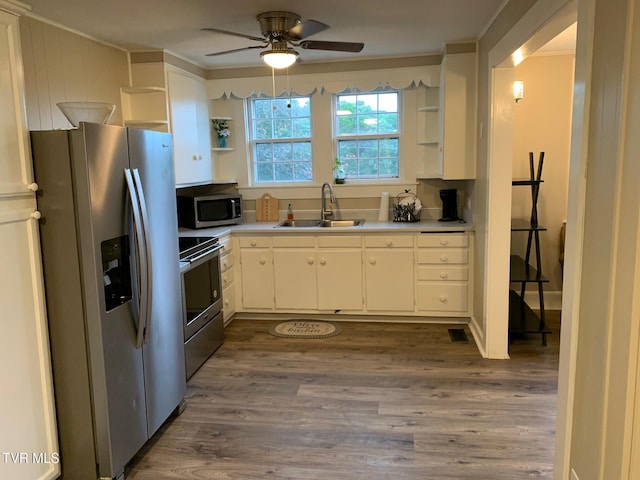 626 N Mohawk Dr, Erwin, TN 37650 - kitchen featuring appliances with stainless steel finishes, open shelves, a sink, crown molding, and ceiling fan