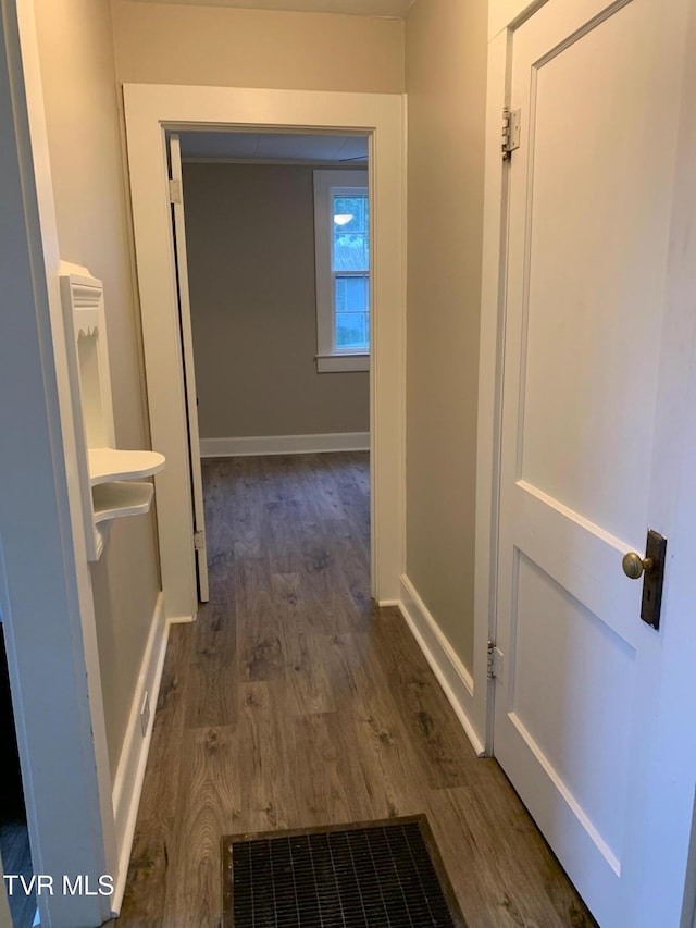 626 N Mohawk Dr, Erwin, TN 37650 - hall featuring dark wood finished floors and baseboards