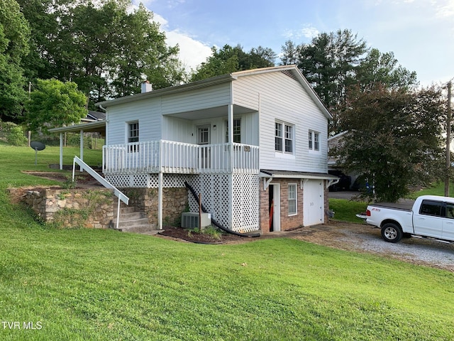 626 N Mohawk Dr, Erwin, TN 37650 - view of front of home with central AC, a front yard, a chimney, and a porch