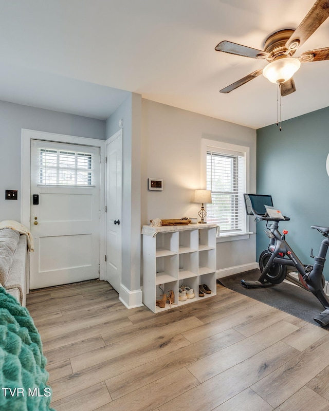 1462 Valley St, Kingsport, TN 37660 - exercise room with light wood-style floors, ceiling fan, and baseboards