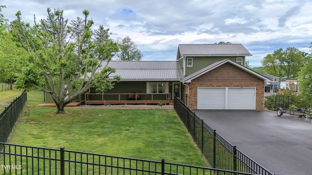 476 Sportsman Dock Rd, Piney Flats, TN 37686 - farmhouse featuring asphalt driveway, an attached garage, metal roof, and stone siding