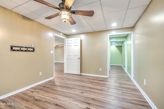 476 Sportsman Dock Rd, Piney Flats, TN 37686 - unfurnished bedroom featuring light wood-type flooring, baseboards, a drop ceiling, recessed lighting, and ceiling fan