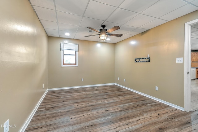 476 Sportsman Dock Rd, Piney Flats, TN 37686 - spare room featuring ceiling fan, wood finished floors, baseboards, and a paneled ceiling