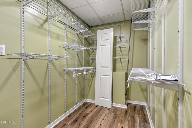 476 Sportsman Dock Rd, Piney Flats, TN 37686 - spacious closet featuring wood finished floors and a drop ceiling