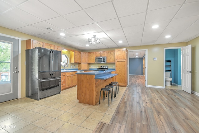 476 Sportsman Dock Rd, Piney Flats, TN 37686 - kitchen featuring appliances with stainless steel finishes, a center island, healthy amount of natural light, a kitchen bar, and recessed lighting