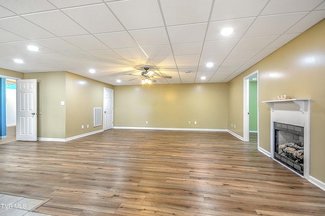 476 Sportsman Dock Rd, Piney Flats, TN 37686 - unfurnished living room with recessed lighting, wood finished floors, a fireplace, ceiling fan, and baseboards