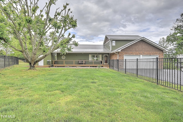 476 Sportsman Dock Rd, Piney Flats, TN 37686 - view of front facade with a garage, metal roof, and a wooden deck