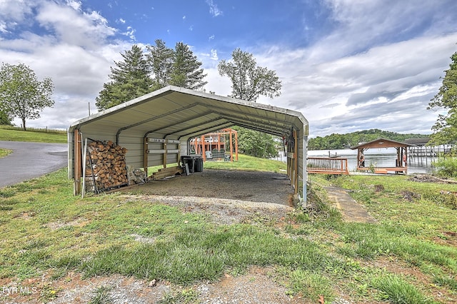 476 Sportsman Dock Rd, Piney Flats, TN 37686 - view of parking featuring a carport and driveway