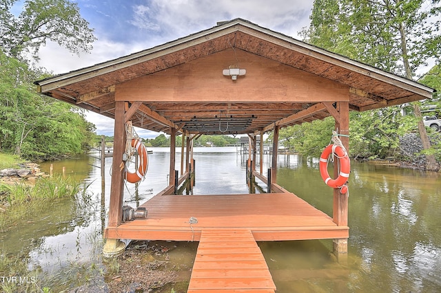 476 Sportsman Dock Rd, Piney Flats, TN 37686 - dock area with boat lift and a water view