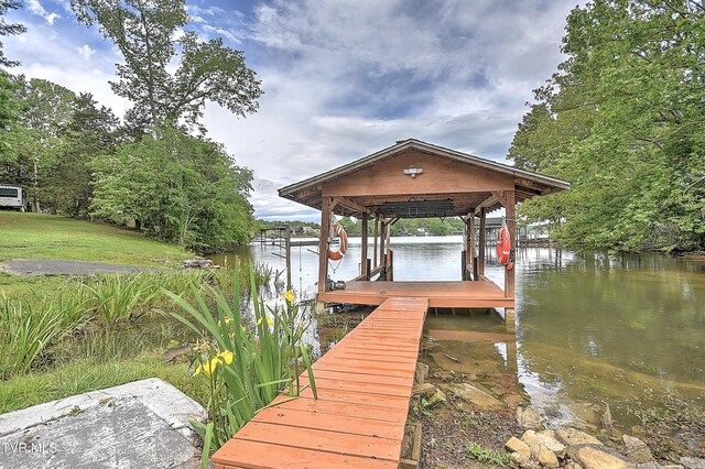476 Sportsman Dock Rd, Piney Flats, TN 37686 - dock featuring boat lift and a water view