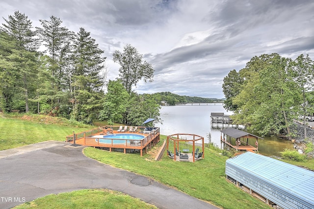 476 Sportsman Dock Rd, Piney Flats, TN 37686 - dock area with a water view and a lawn