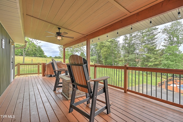 476 Sportsman Dock Rd, Piney Flats, TN 37686 - deck with a ceiling fan and view of scattered trees