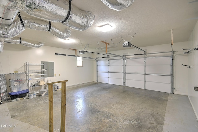 476 Sportsman Dock Rd, Piney Flats, TN 37686 - garage featuring a garage door opener and baseboards