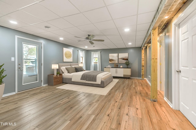 476 Sportsman Dock Rd, Piney Flats, TN 37686 - bedroom with light wood-type flooring, baseboards, recessed lighting, a paneled ceiling, and access to exterior