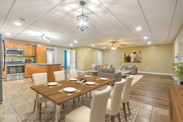 476 Sportsman Dock Rd, Piney Flats, TN 37686 - dining area with light tile patterned floors, baseboards, a paneled ceiling, ceiling fan, and recessed lighting