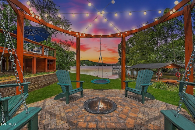 476 Sportsman Dock Rd, Piney Flats, TN 37686 - view of patio with an outdoor fire pit and a water view