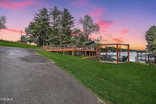 476 Sportsman Dock Rd, Piney Flats, TN 37686 - view of front of home featuring a yard, boat lift, a boat dock, and a water view
