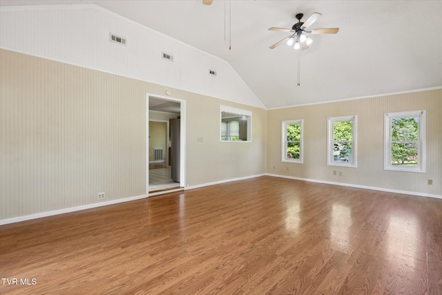 1700 Ridgeway Dr, Kingsport, TN 37664 - spare room featuring ceiling fan, wood finished floors, vaulted ceiling, and baseboards