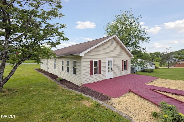 1700 Ridgeway Dr, Kingsport, TN 37664 - view of side of home with a wooden deck, a lawn, and roof with shingles