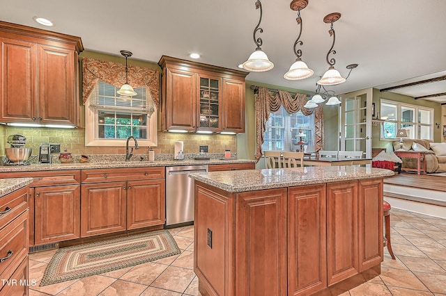2309 Oxford Ct, Kingsport, TN 37660 - kitchen with stainless steel dishwasher, a sink, light tile patterned floors, a center island, and recessed lighting