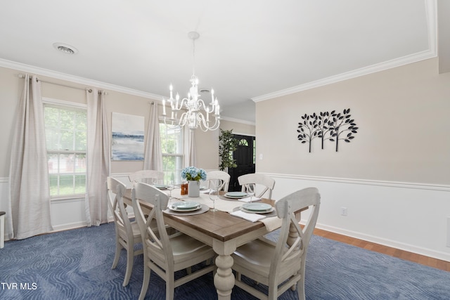 821 Regency Dr, Johnson City, TN 37604 - dining area with a chandelier, ornamental molding, baseboards, and wood finished floors
