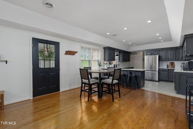 821 Regency Dr, Johnson City, TN 37604 - dining area with light wood-style flooring, recessed lighting, and baseboards