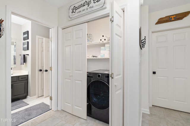 821 Regency Dr, Johnson City, TN 37604 - clothes washing area featuring washer / dryer and light tile patterned floors