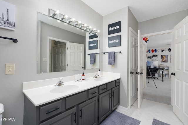 821 Regency Dr, Johnson City, TN 37604 - full bath with double vanity and tile patterned flooring