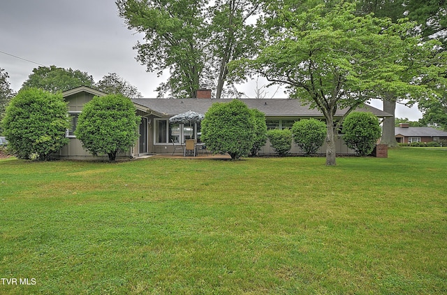 441 High Ridge Rd, Kingsport, TN 37660 - view of property hidden behind natural elements with a front yard and a chimney