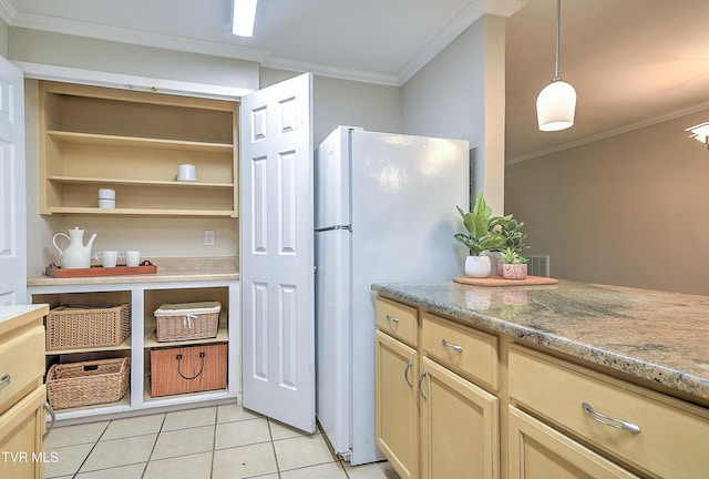 441 High Ridge Rd, Kingsport, TN 37660 - kitchen featuring crown molding, freestanding refrigerator, light tile patterned flooring, light stone countertops, and hanging light fixtures