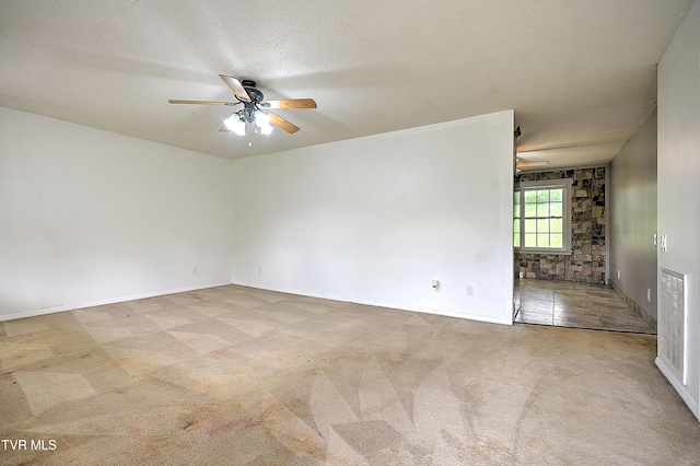 18505 Ironwood Loop, Abingdon, VA 24210 - empty room with ceiling fan, carpet, and a textured ceiling