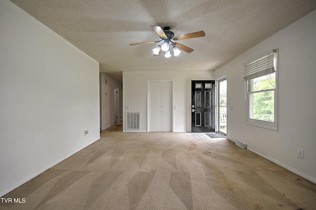 18505 Ironwood Loop, Abingdon, VA 24210 - carpeted spare room featuring a textured ceiling, a ceiling fan, and baseboards