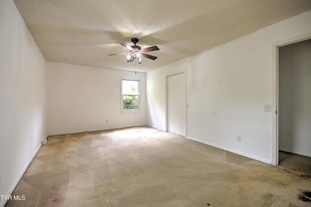18505 Ironwood Loop, Abingdon, VA 24210 - unfurnished bedroom featuring carpet floors, a textured ceiling, baseboards, and a ceiling fan