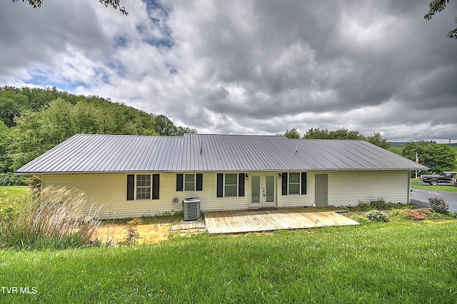 18505 Ironwood Loop, Abingdon, VA 24210 - rear view of property featuring french doors, metal roof, a yard, central AC, and a wooden deck