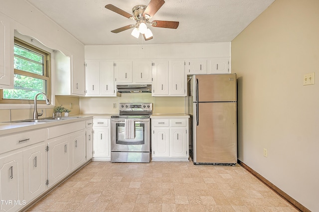 kitchen featuring stainless steel appliances, a sink, under cabinet range hood, and white cabinets