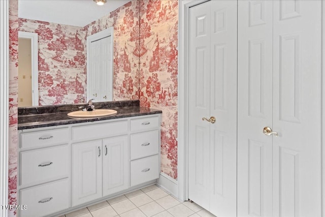 121 Queensgate, Bristol, TN 37620 - bathroom with a closet, wallpapered walls, vanity, and tile patterned floors