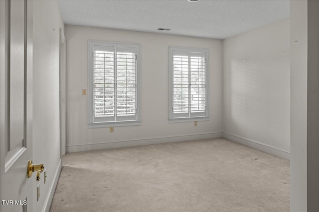 121 Queensgate, Bristol, TN 37620 - carpeted spare room with a textured ceiling and baseboards